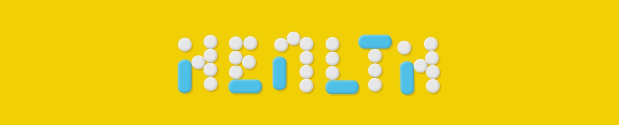 Slika prikazuje napis health z tableti in kapsulami na rumenem ozadju.